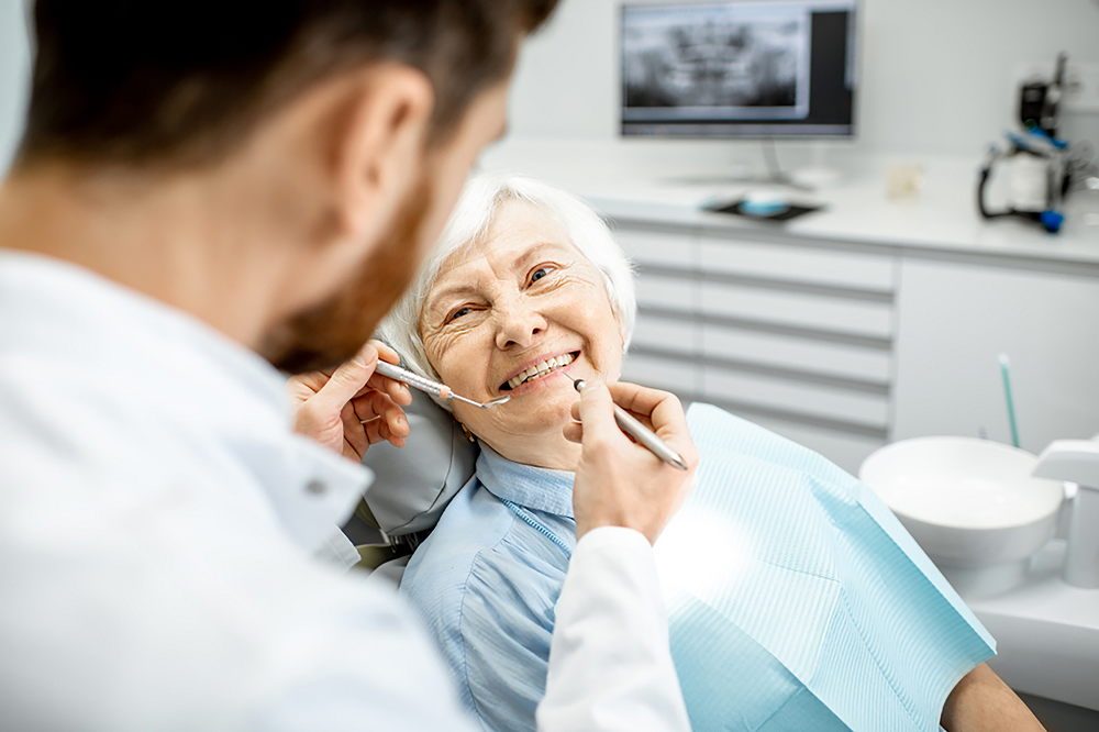 woman having dentures treatment