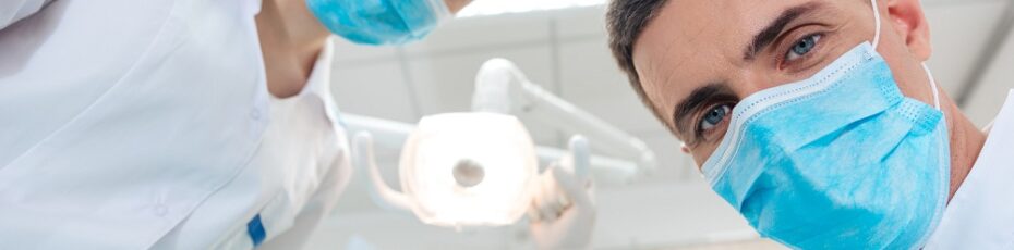 dentist performing routine dental checkups