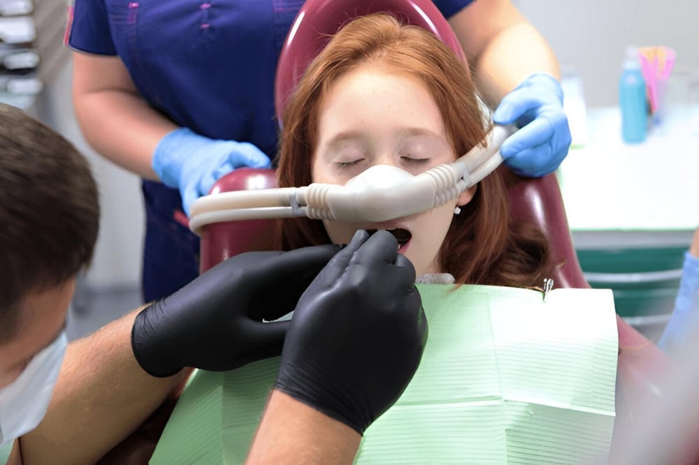Patient receiving IV sedation at a dental clinic